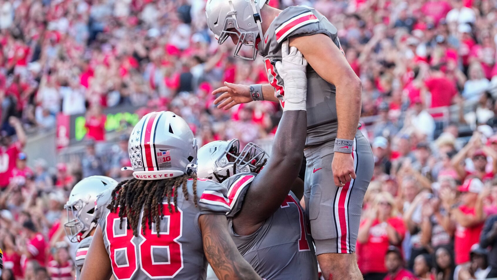 Ohio State Buckeyes quarterback Will Howard celebrates a touchdown