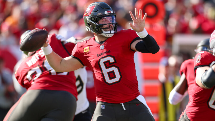 Baker Mayfield drops back to pass