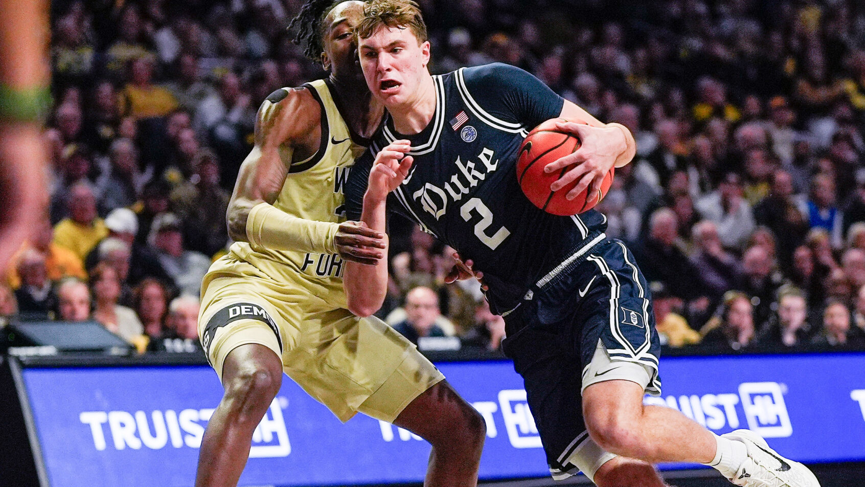Cooper Flagg drives versus a Wake Forest defender.