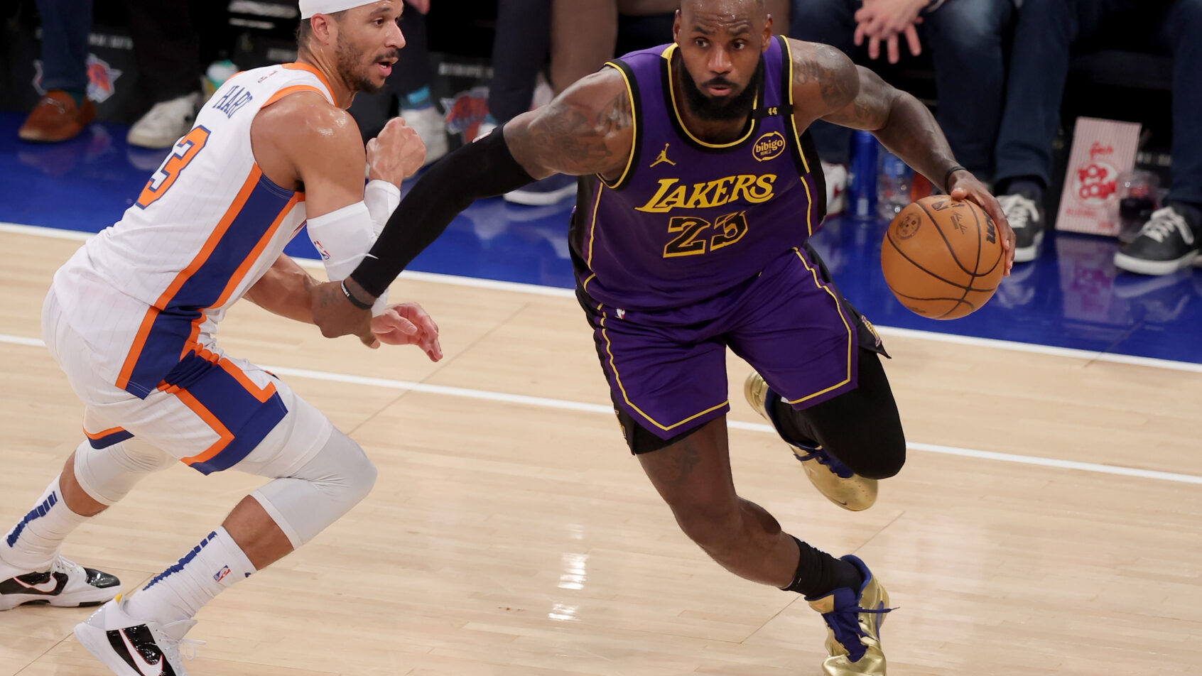Los Angeles Lakers forward LeBron James tries to drive around New York Knicks guard Josh Hart