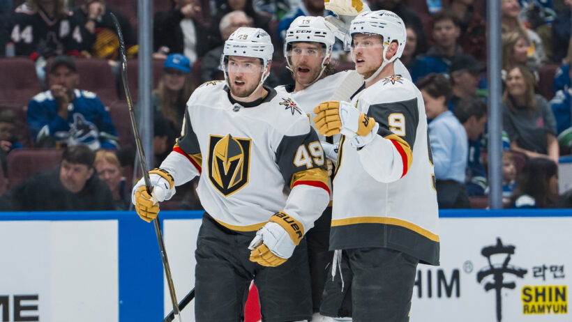 The Golden Knights celebrate a goal vs the Canucks.