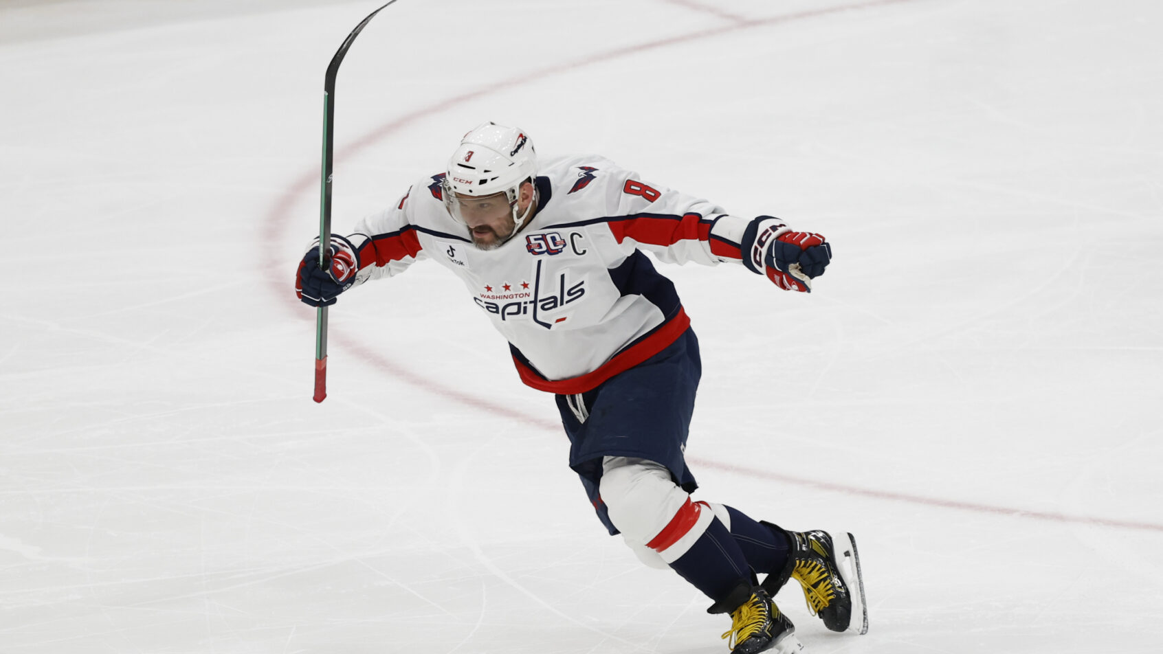 Alex Ovechkin celebrates his record breaking goal.
