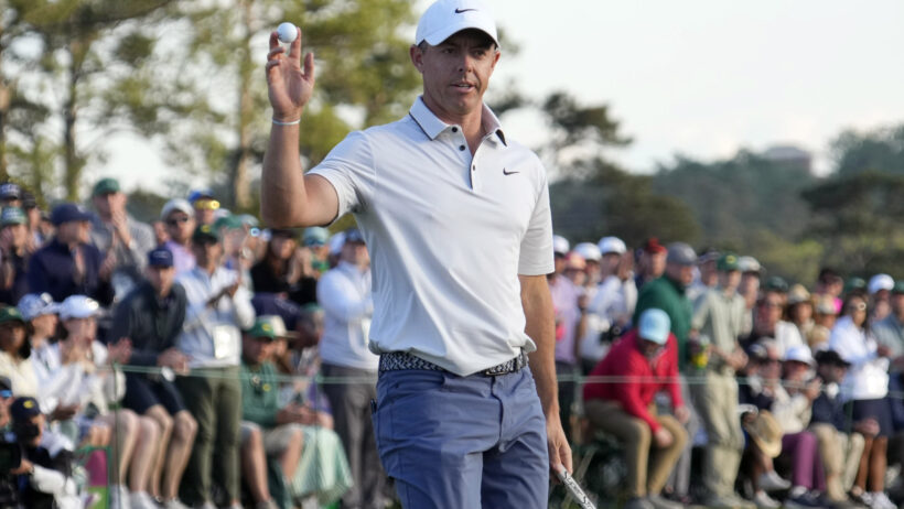 Rory McIlroy waves to the crowd after finishing his 3rd round at the Masters.