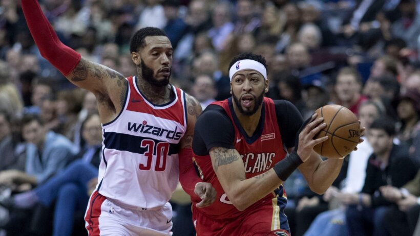 Anthony Davis drives to the basket.