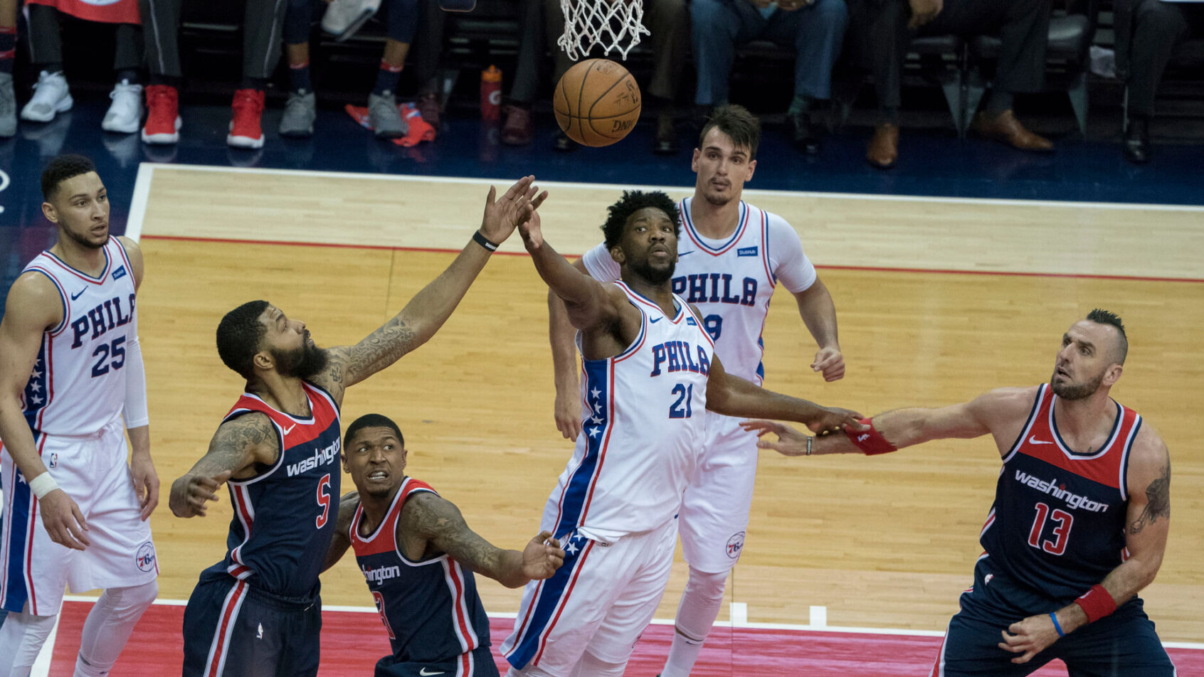 Joel Embiid grabs a rebound
