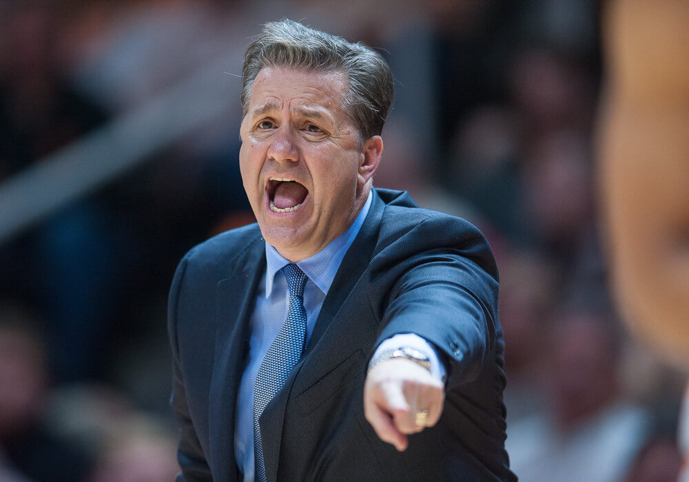 Kentucky basketball coach John Calipari screaming on the sideline.
