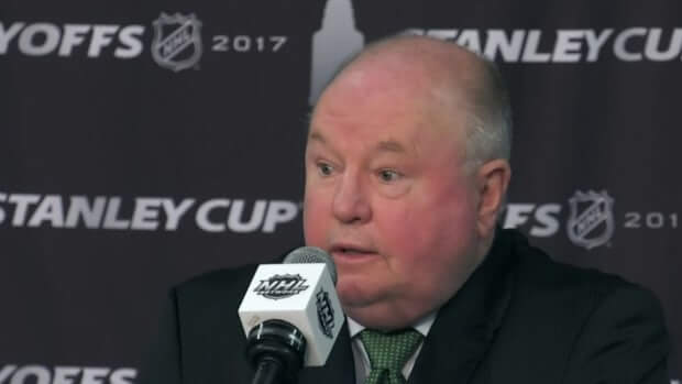 Bruce Boudreau at podium