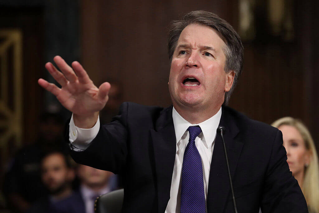 Brett Kavanaugh testifying before Congress.