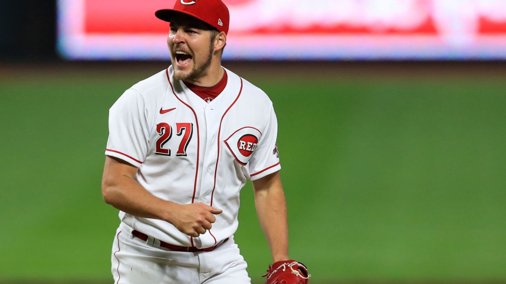 Cincinnati Reds' player Trevor Bauer showing an excited reaction.
