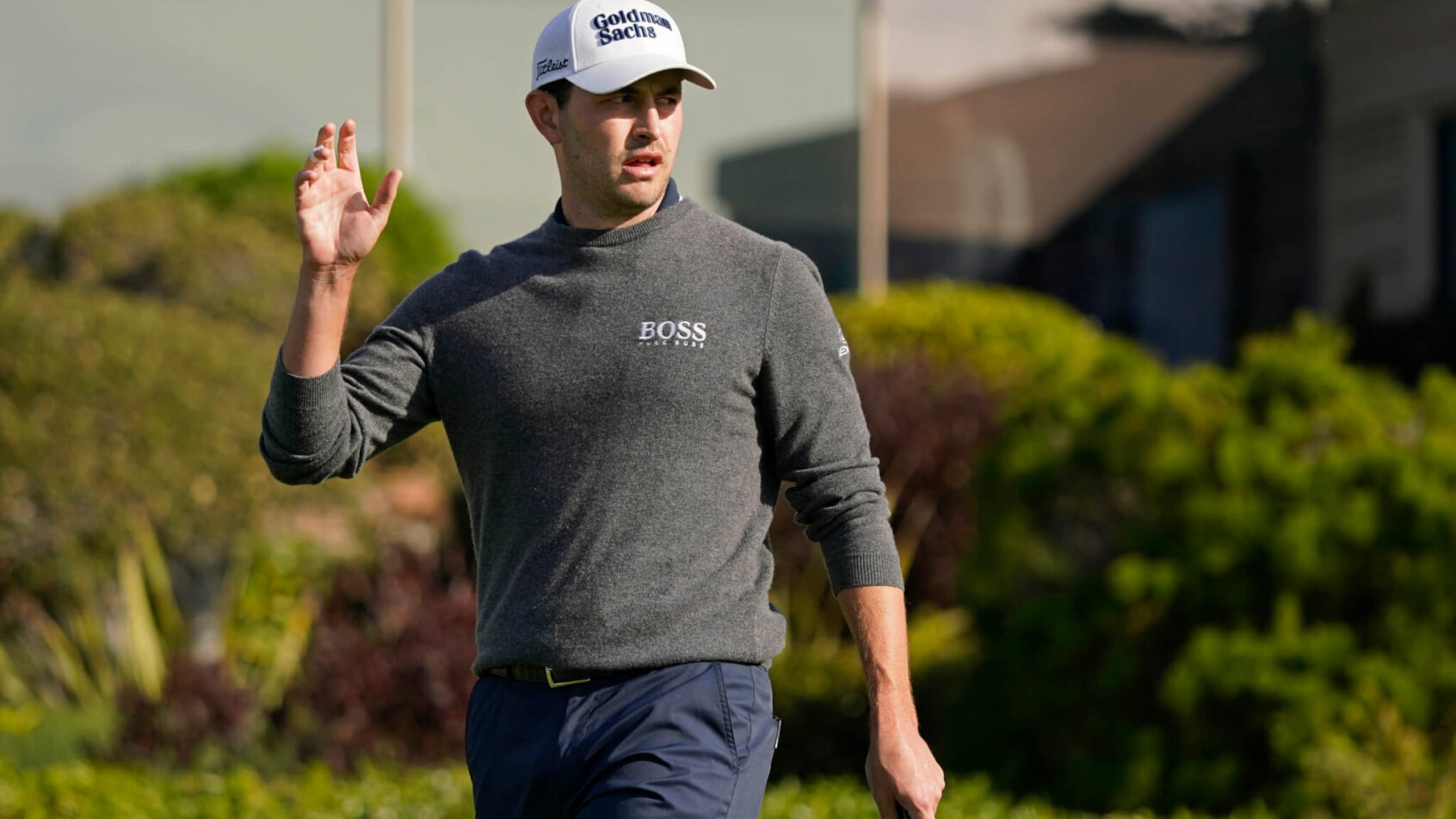 Patrick Cantlay acknowledges the crowd after making a putt