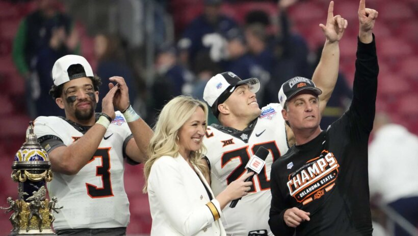 Oklahoma State players celebrating their 2022 Fiesta Bowl win