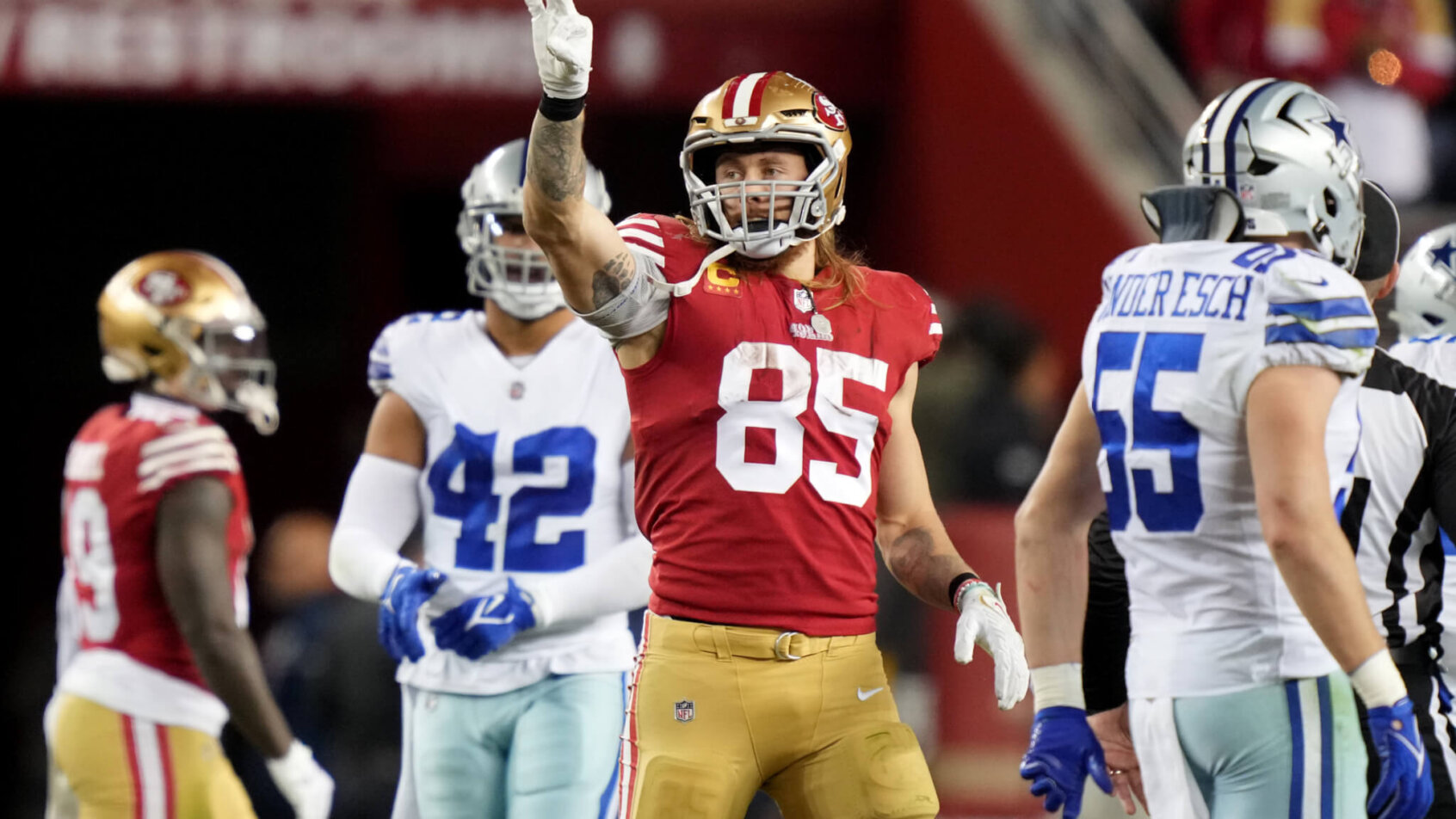 George Kittle celebrates a first down