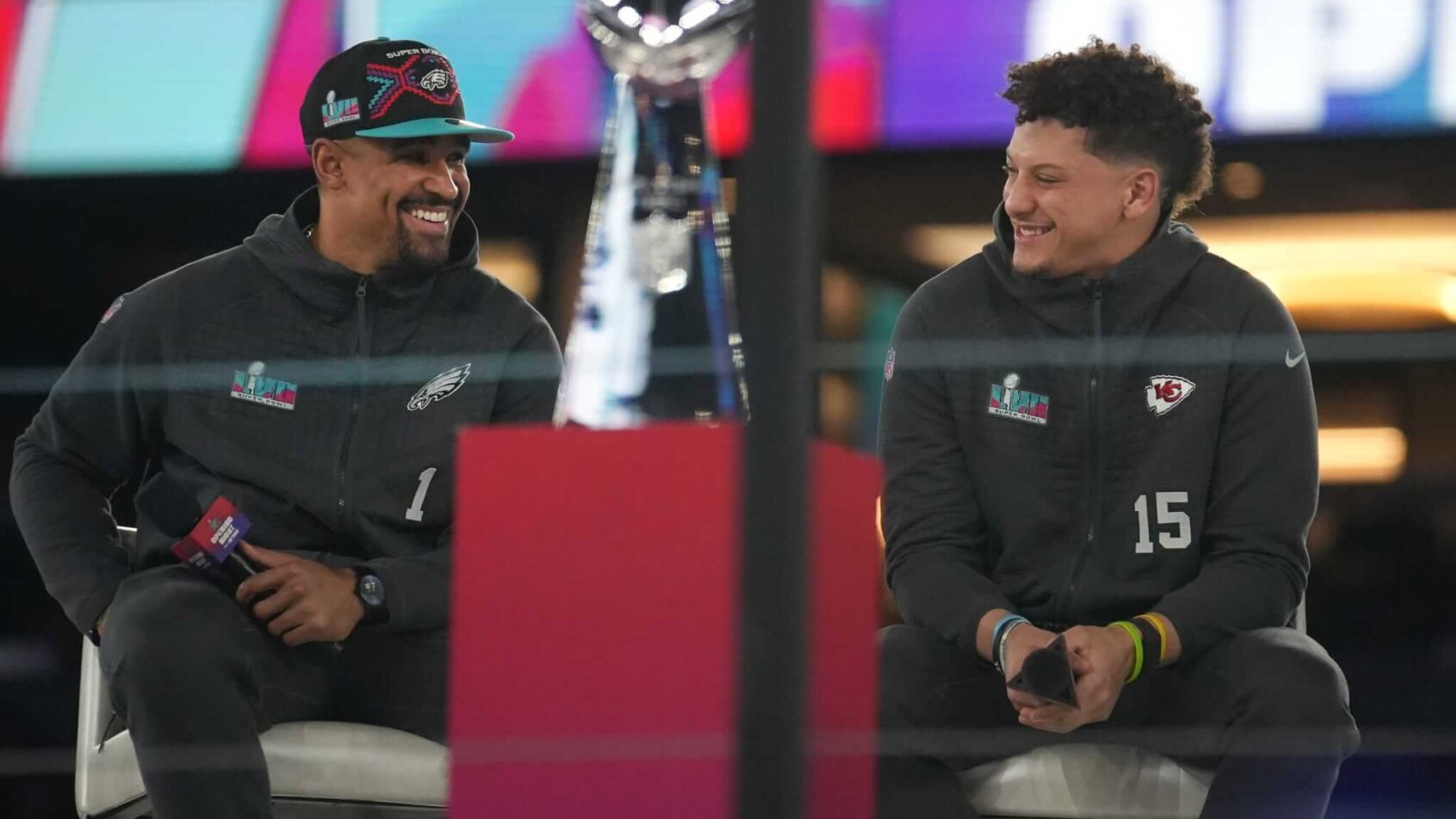 Patrick Mahomes and Jalen Hurts on stage