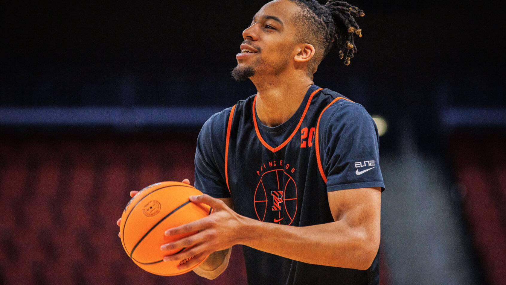 Princeton basketball warming up for March Madness.