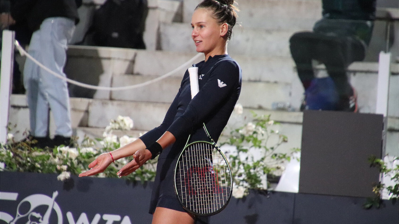 Russia's Veronika Kudermetova argues a ball mark