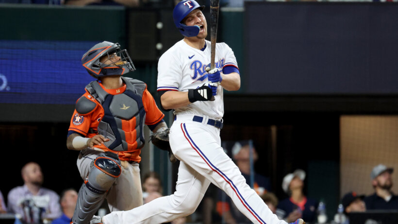 Texas Rangers shortstop Corey Seager reacts in dismay after a pop-out
