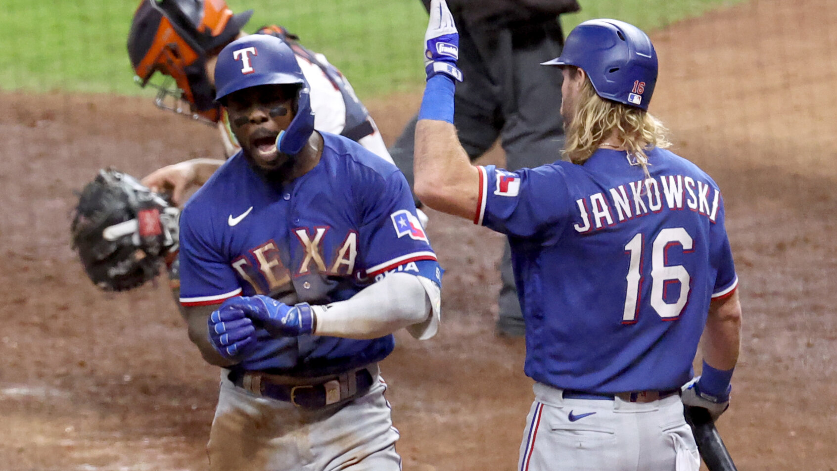 Texas Rangers right fielder Adolis Garcia celebrating a home run