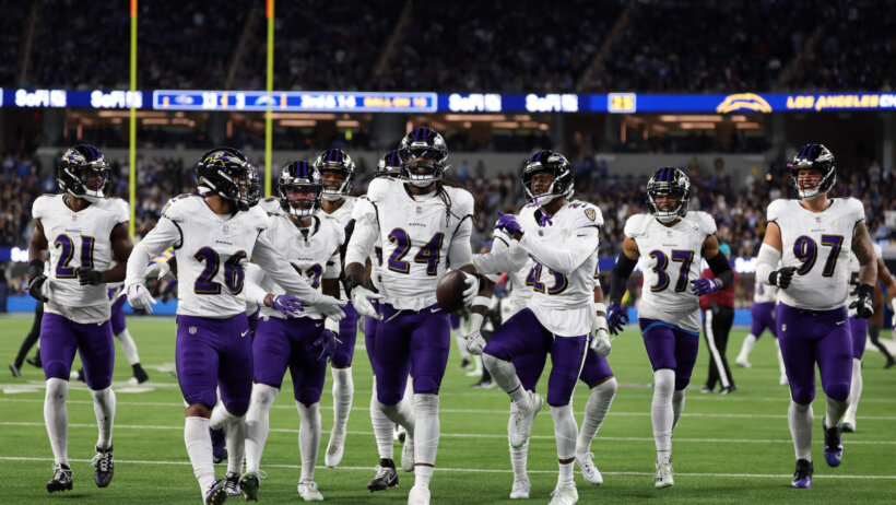 Baltimore Ravens linebacker Jadeveon Clowney (24) celebrates with his teammates after recovering a fumble