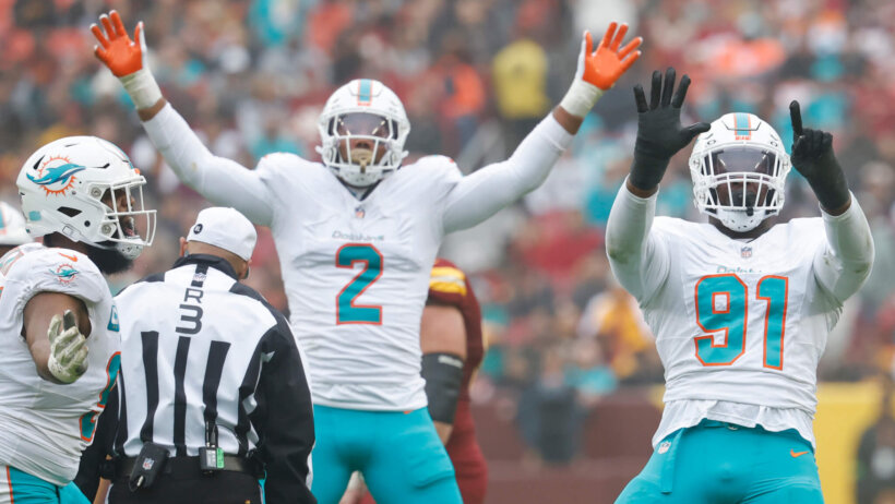 Miami Dolphins defensive end Emmanuel Ogbah (91) celebrates after recording a sack a