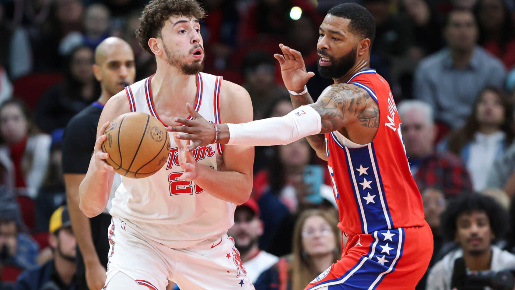 Houston Rockets center Alperen Sengun is guarded by Philadelphia 76ers forward Marcus Morris Sr