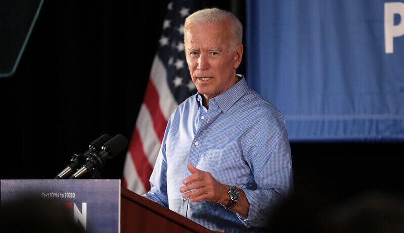 Joe Biden speaking at a podium
